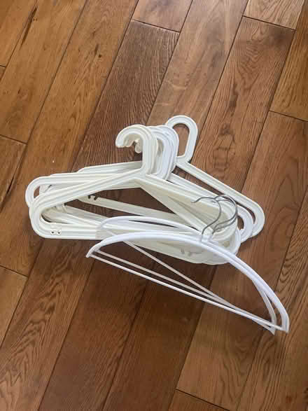 Photo of free A dozen white hangers (Brighton) #1