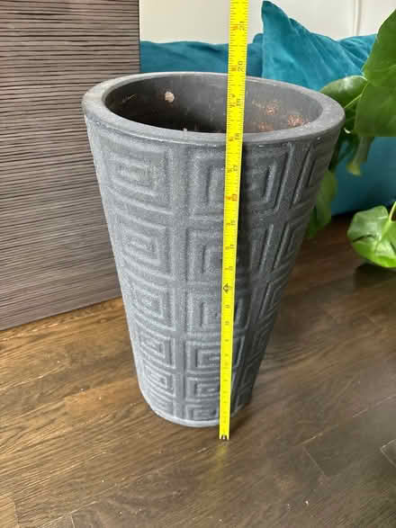 Photo of free Tall concrete planter (240 W 73rd St) #1