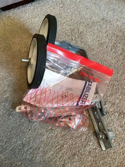Photo of free Child’s bike stabilisers and fixings (Foxholes SG13) #1