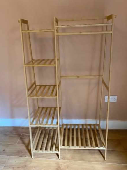 Photo of free Four clothes racks (Canary Wharf) #1