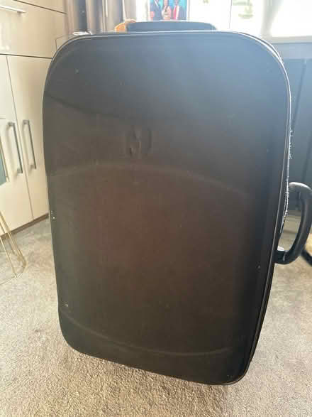 Photo of free Medium sized black suitcase (Chapeltown S35) #1