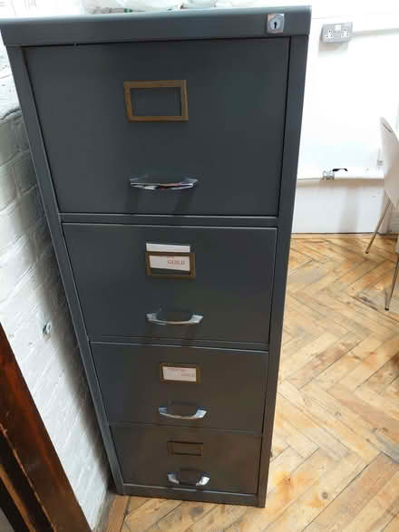 Photo of free Four drawer metal filing cabinet (Wandsworth Common SW17) #1