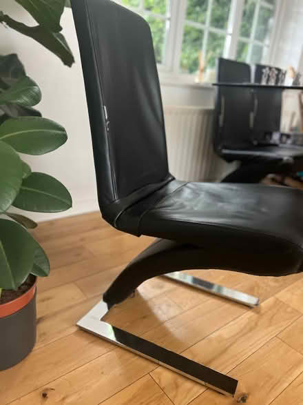 Photo of free 6 faux leather dining chairs (GU2) #1