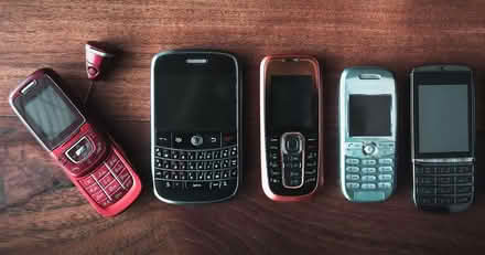 Photo of Mobile phone with charger (CF24 4QH) #1