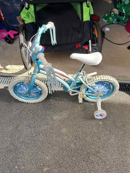 Photo of free Kids frozen bike with stabilisers (Thrapston) #1