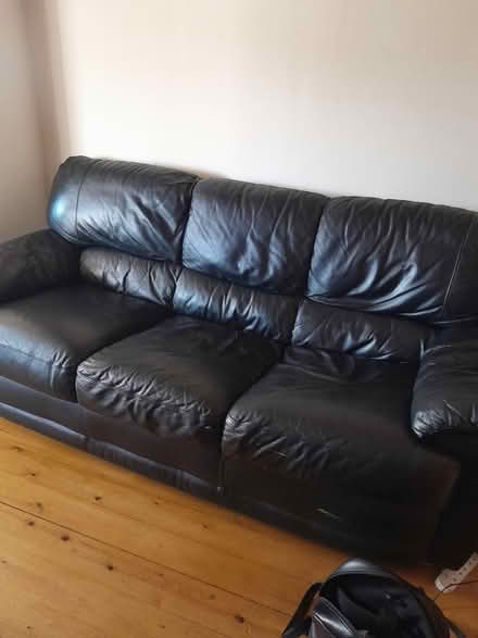 Photo of free Black leather settee good cond (Darlington) #1