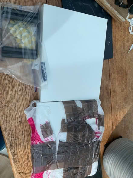 Photo of free 2 white floating shelves - new (Addlestone KT15) #1