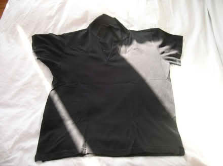 Photo of free Black polo top (Streatham Park SW16) #1