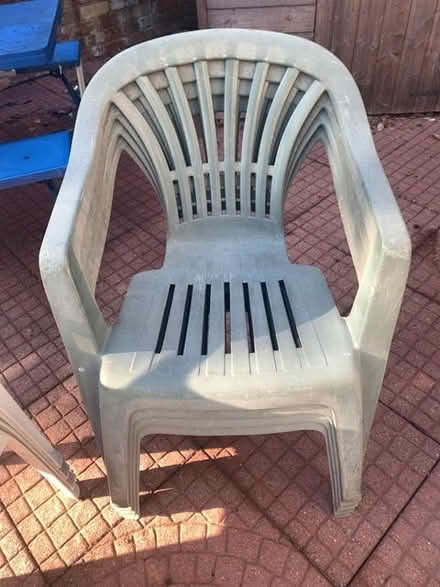 Photo of free 8 plastic garden chairs (Winyates West B98) #2