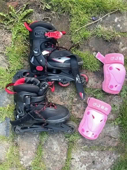 Photo of free Roller blades child size 29-32 and elbow pads (Selmeston BN26) #1