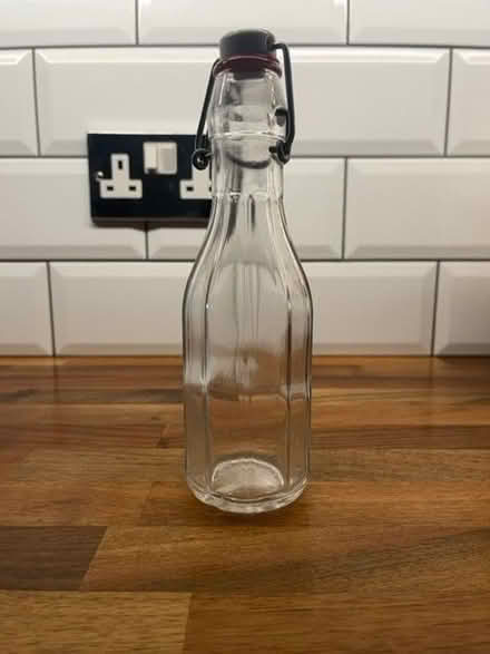 Photo of free 250 ml flip top glass bottle (Phippsville) #1