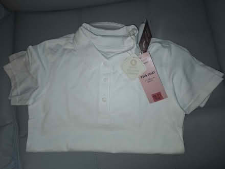 Photo of free 2 girls school polo shirts age 10-11 years. Brand new. (Newport Pagnell MK16) #1