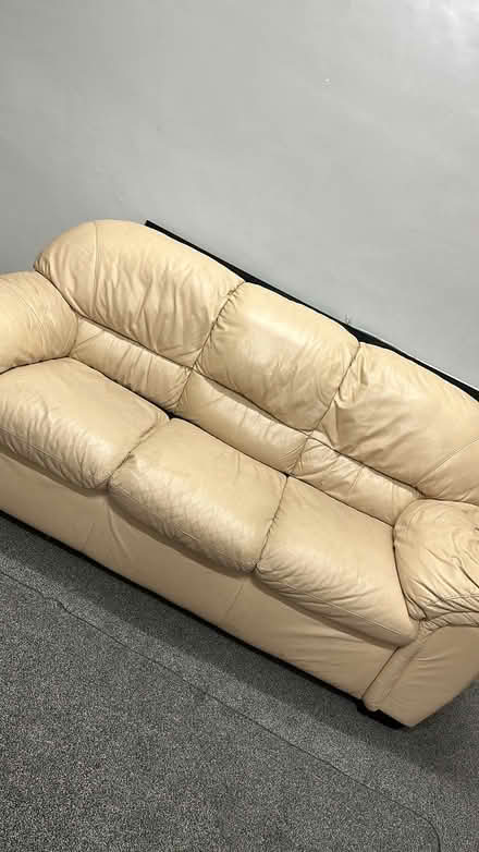 Photo of free 2 cream leather 3 seater sofas (Thornhill lees Dewsbury) #4
