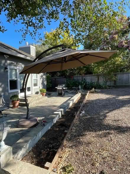Photo of free Large patio umbrella (West side Petaluma) #2