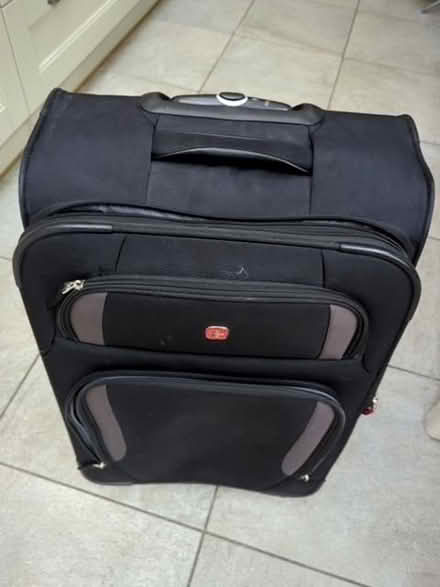 Photo of free Black wenger suitcase (4 wheels) (Egham TW20) #3