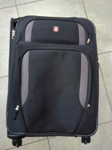 Photo of free Black wenger suitcase (4 wheels) (Egham TW20) #1