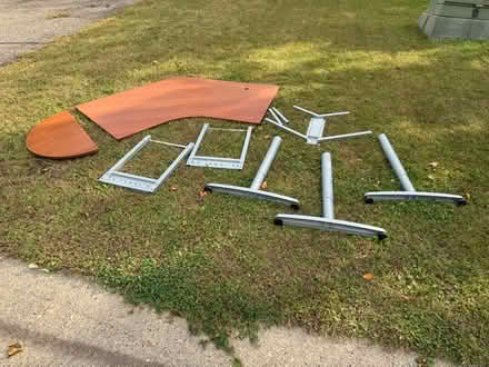 Photo of free IKEA corner desk with 3 legs (9933 82nd St S, Cottage Grove) #1