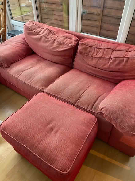 Photo of free Red sofa with pouffe (Slyfield) #1