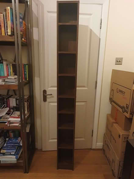 Photo of free Tall shelving unit - dark wood (East Sheen SW14) #1