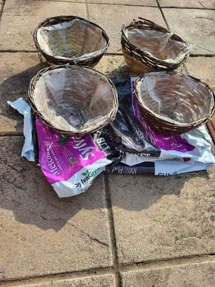 Photo of free Four empty hanging baskets and two empty compost bags (Warden Hill GL51) #1