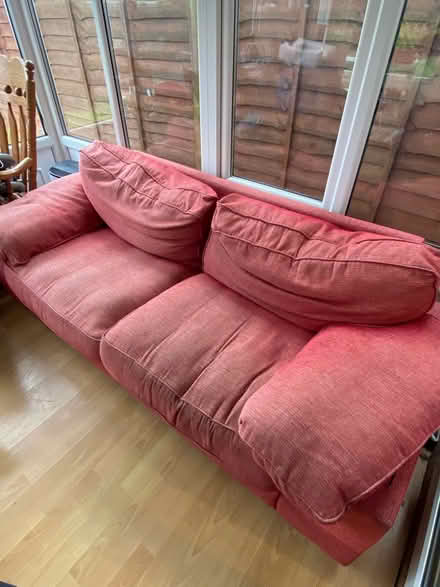Photo of free Red sofa with pouffe (Slyfield) #3