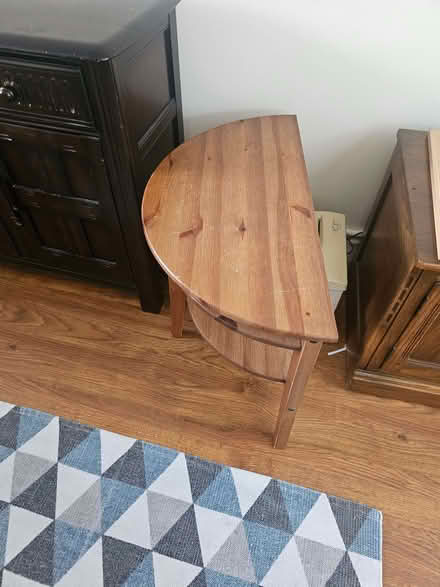 Photo of free Half circle table/ tv stand (Bohemia TN37) #1