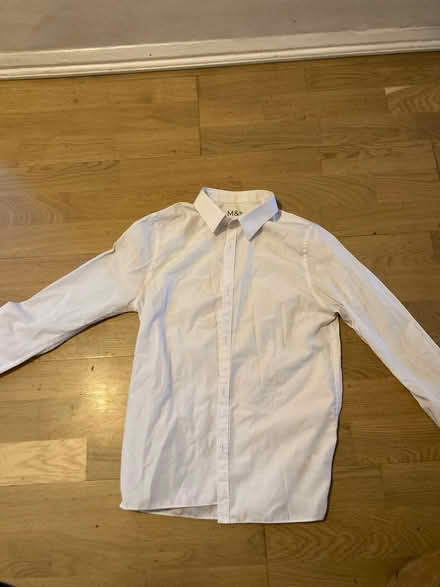 Photo of free 6 long sleeved white school shirts (M20 east didsbury) #2