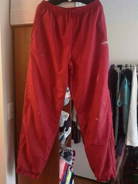 Photo of free adidas red trackpants Med/Large (2871 Richmond Road/pinecrest) #1