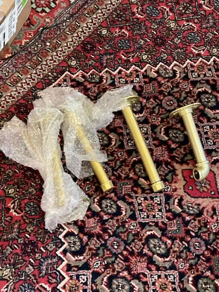 Photo of free Five gold pipe wall hooks (Dempster east of Ridge) #1