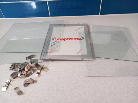 Photo of free Small sheets of glass and snapframe (Woodley RG5) #1