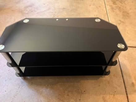 Photo of free Dark glass Tv stand (Fort Sheridan) #3