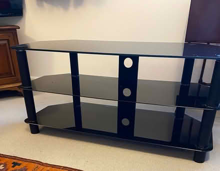 Photo of free Black glass corner TV stand (Sevenoaks, near Station) #1