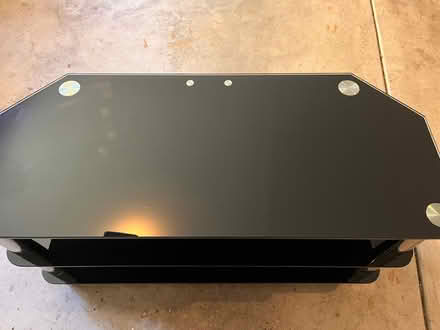 Photo of free Dark glass Tv stand (Fort Sheridan) #2