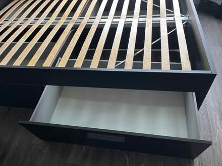 Photo of free Queen bed frMe with drawers (59 & west liberty) #4