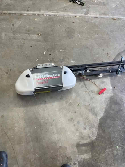 Photo of free Garage door opener needs new belt (Near Riggs and Cooper) #1