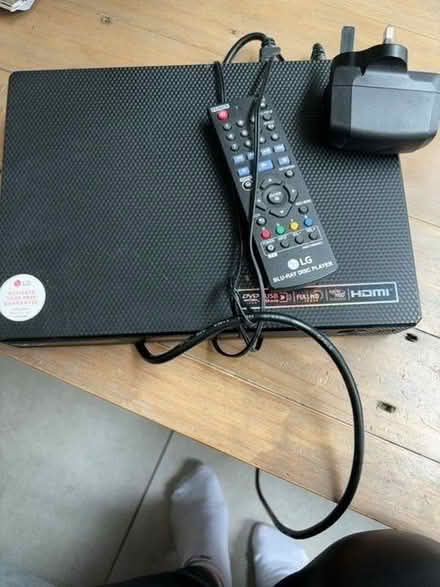 Photo of free LG DVD player & remote. (Timperley WA15) #1