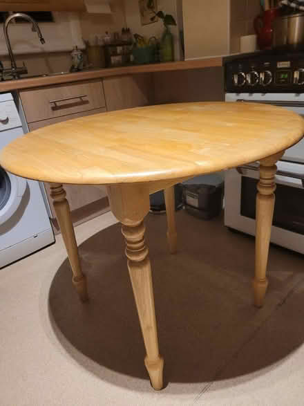 Photo of free Circular wooden table (Queen's Park) #1