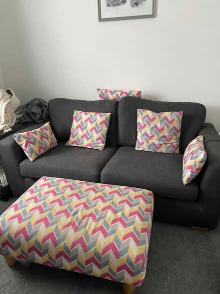 Photo of free 2 Seater Grey Sofa and footstool (Cowplain) #1