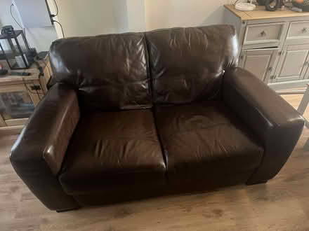 Photo of free Two seater brown leather sofa (Grantham NG31) #1