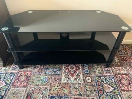 Photo of free Black glass TV stand (ME4) #2
