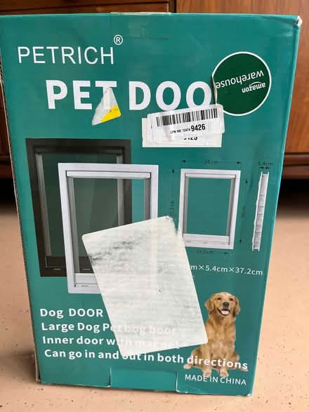Photo of free Unused pet door (DA12) #2