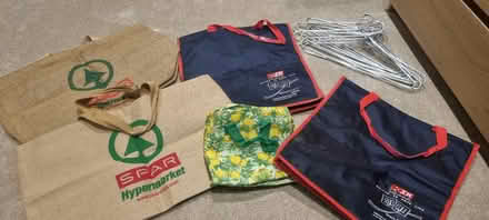 Photo of free Shopping bags and aluminium hangers (Banstead SM7) #1