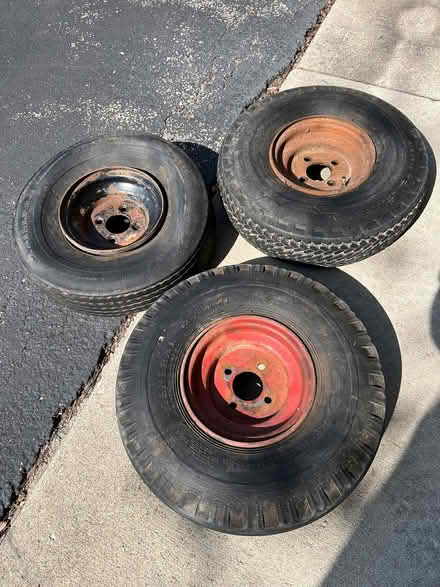 Photo of free 3 trailer rims and tires (96th & Westfield) #1