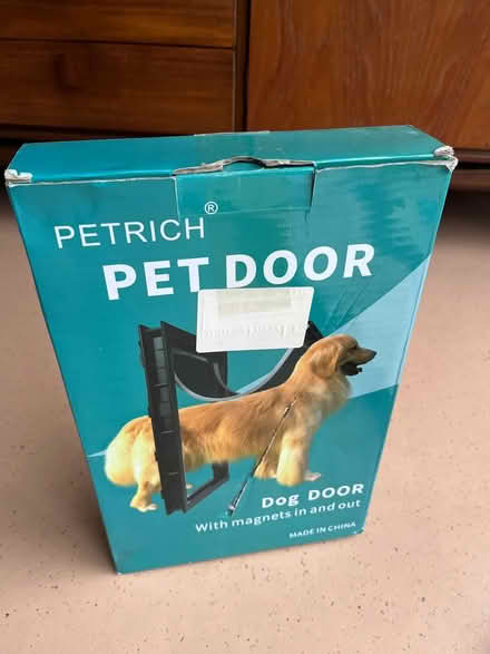 Photo of free Unused pet door (DA12) #1
