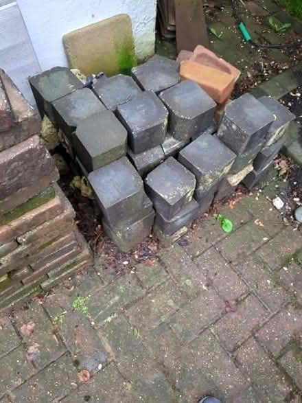Photo of free Approx 30 black edging paving blocks (Norbiton KT3) #1