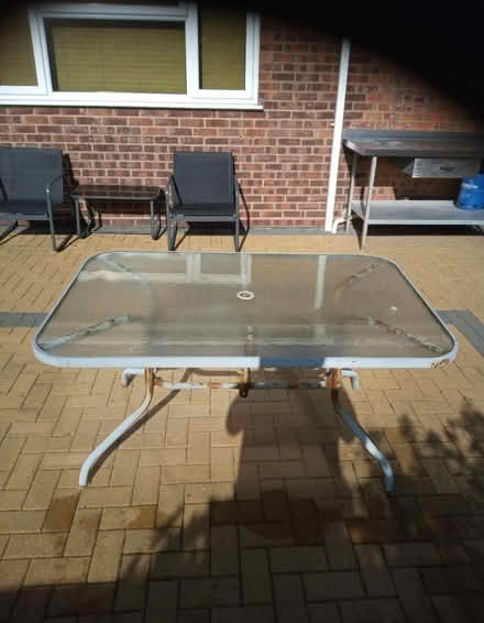 Photo of free Outdoor glass top table (NR30) #2