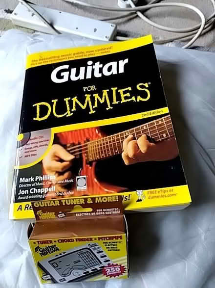 Photo of free Book and guitar tuner (Leigh RH2) #1