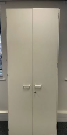 Photo of free Tall Wooden Cupboard (Lutterworth LE17) #1