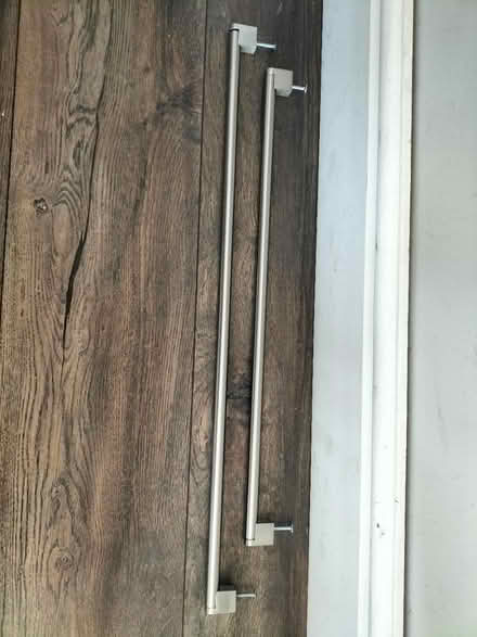 Photo of free 2 brushed chrome handles (Hastings TN34) #1