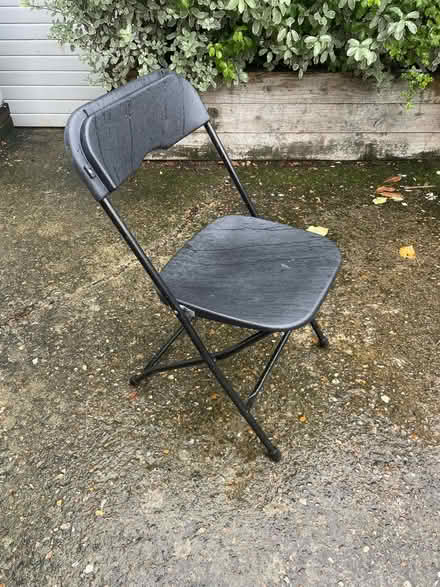 Photo of free 42 x black folding chairs (Southfields SW19) #1